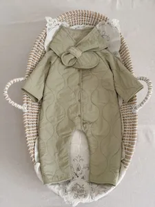 Cozy quilted baby romper with warm fleece lining, vintage green infant jumpsuit for cold winter days.