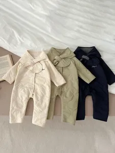 Detailed view of winter thickened baby fleece romper featuring stylish quilted design and bow collar.