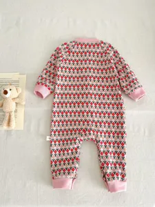 Knitted baby romper with red tulip pattern, long sleeves, comfortable autumn baby wear.