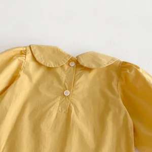 Baby girl yellow cotton long sleeve blouse with peter pan collar detail view