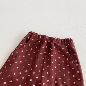 Girls floral print long pants detail, comfortable cotton trousers with elastic waist and side pockets.