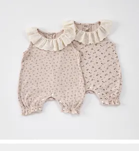 Cute floral baby romper with frilly collar and sleeveless design, perfect for summer days.