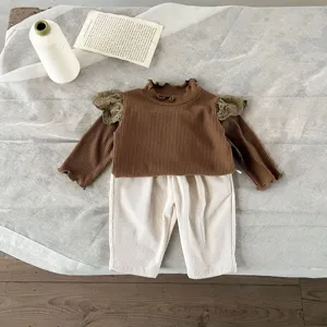Infant baby ribbed long sleeve top and pants set detail view, cute vintage style clothing.