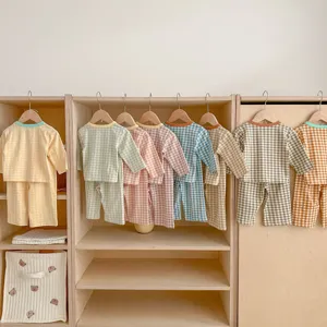Baby cotton checkered pajama set, long sleeve top and pants, comfortable toddler sleepwear.