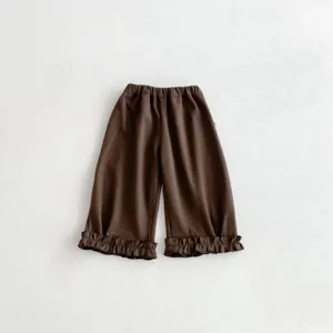 Détails de pantalon marron pour enfants avec bas à volants et taille élastique mignonne.