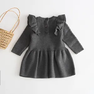 Baby girls winter dark grey knit dress long sleeve ruffle sweater dress detail view.