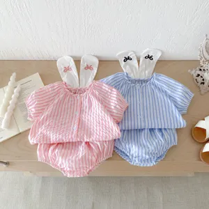 Detail view of baby girl summer striped split set with cute bunny ears and exquisite embroidery design.