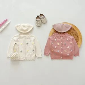 Cozy baby girl knit cardigan set with handmade floral embroidery, beret, and matching shoes.