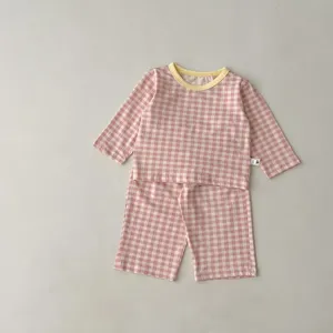 Cute baby cotton gingham long sleeve top and trousers set, comfortable infant sleepwear.