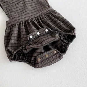 Infant baby girl brown plaid sleeveless romper detail view, soft fabric with snap buttons