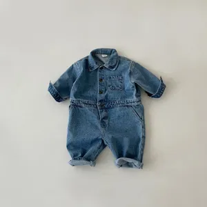 Infant denim baby jumpsuit detail showing the stylish long sleeve romper collar design style.