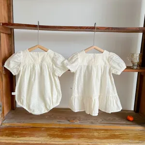Baby summer embroidery dress and romper detail view, sweet bubble sleeve infant clothing.