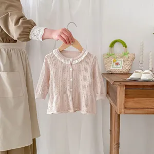 Cute baby girl knit cardigan, breathable hollow-out summer jacket, soft and stylish infant wear.