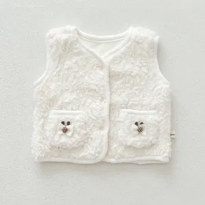 Detailed view of white fleece baby vest with cute plaid bear pocket design for winter