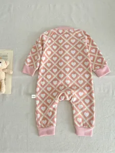 Knit baby romper with cute pink heart argyle pattern, soft long sleeve infant jumpsuit.
