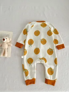 Cute baby knit romper with sweet orange pattern, cozy long sleeve infant jumpsuit for autumn.
