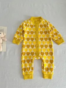 Yellow baby knit romper with heart pattern, long sleeve infant jumpsuit for autumn wear.