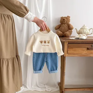 Baby toddler knit sweater and denim pants set with cute animal embroidery, detailed view.