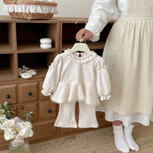 Toddler girls spring two-piece set featuring ruffle collar, mesh bow doll top and cute flare pants.