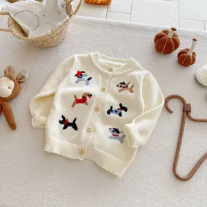 Detailed view of baby cute puppy embroidered knit cardigan, cream white toddler autumn sweater.
