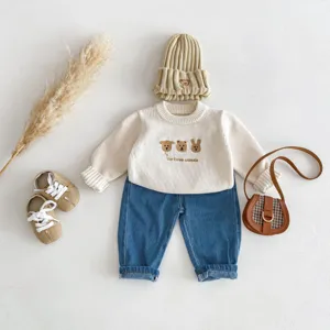 Baby knit sweater set with cute animal embroidery, long sleeve pullover and denim jeans outfit.