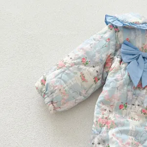 Winter baby thickened cotton romper with cute cat and rose print, blue bow and collar detail.