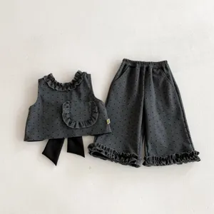 Stylish girls spring outfit set, cute polka dot sleeveless top and wide leg pants.