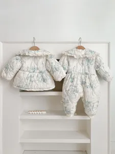 Baby thick padded jumpsuit and floral print jacket set, warm winter infant clothing detail.