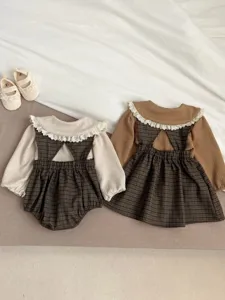 Cute baby girl matching outfit set featuring lace collar top and plaid romper dress.