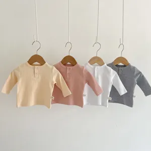 Baby long sleeve ribbed t-shirt detail, soft cotton crew neck top for infant boys and girls.