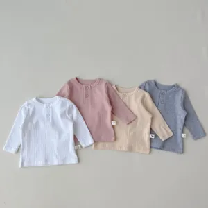 Infant ribbed cotton long sleeve crew neck t-shirt for baby boys and girls, comfortable daily autumn wear.
