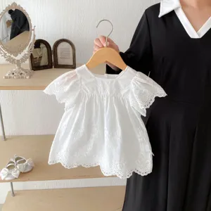 Exquisite white lace embroidery and delicate fly sleeves detail on soft baby cotton summer dress.