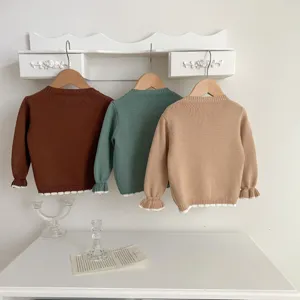 Children long sleeve knit sweater in brown green and khaki with cute ruffle trim details.