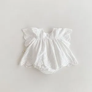 Detailed view of white baby girl cotton lace flutter sleeve romper, exquisite embroidery design.