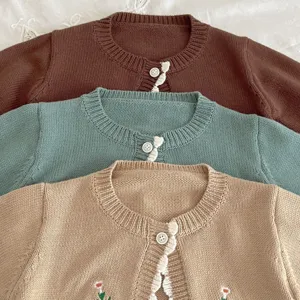 Infant baby knit cardigan details, cute floral embroidery, soft cotton sweater top.