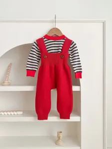 Baby knit overalls detail shot, featuring red striped long sleeve top and suspender pants.