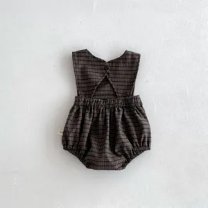 Infant baby girl dark plaid sleeveless romper detail, featuring cute cross back strap and button.