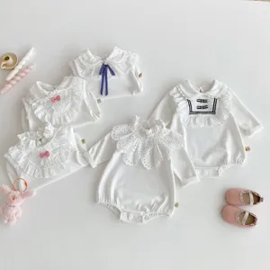 Infant baby girl long sleeve white romper with delicate lace doll collar and cute bow details.