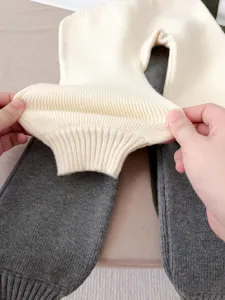 Detailed shot of baby knit pants showing soft ribbed texture and great elasticity for comfort.
