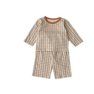 Cute baby cotton plaid long sleeve top and shorts two piece set in brown, main view display.