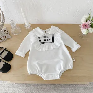 Infant baby girl long sleeve white romper with sailor lace collar and bow detail, cute crawler.