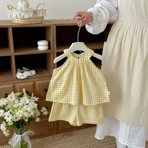 Bambina ragazze top halter a quadri gialli e pantaloncini estate dettaglio vestito