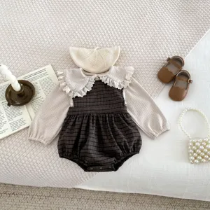 Infant baby girl plaid romper set with cute lace collar, knit hat, and leather shoes.