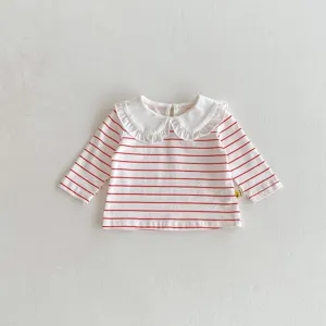 Details of baby girl long sleeve t-shirt with red stripes and sweet ruffled doll collar.