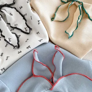 Set top neonato in cotone a costine con grazioso bordo per estate dei bambini