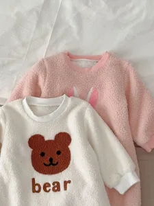 Cute baby fleece romper set featuring a fluffy white bear design and pink rabbit style for winter warmth.