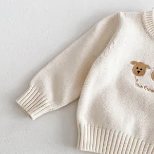 Baby knit sweater detail shot, cute animal embroidery, soft crewneck pullover for infants.