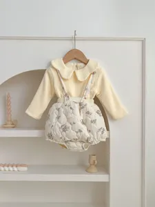 Detailed shot of Korean style baby floral quilted romper set with cute collar and soft fabric.