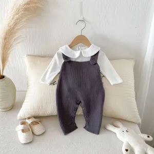 Cozy baby knitted romper set with white collar and grey bib pants, ideal autumn baby outfit.