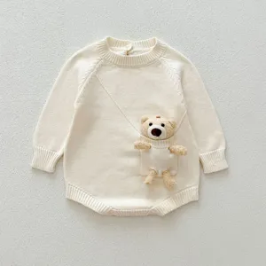 Cute baby knit romper with adorable bear pocket detail, soft cotton long sleeve bodysuit.